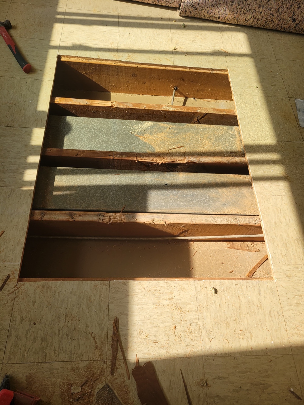 Subfloor area opened before repair